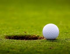 golf ball at hole